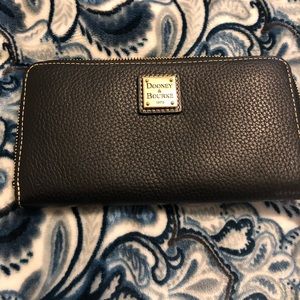 black.. 12 card slots . I inside zipper . 3 areas